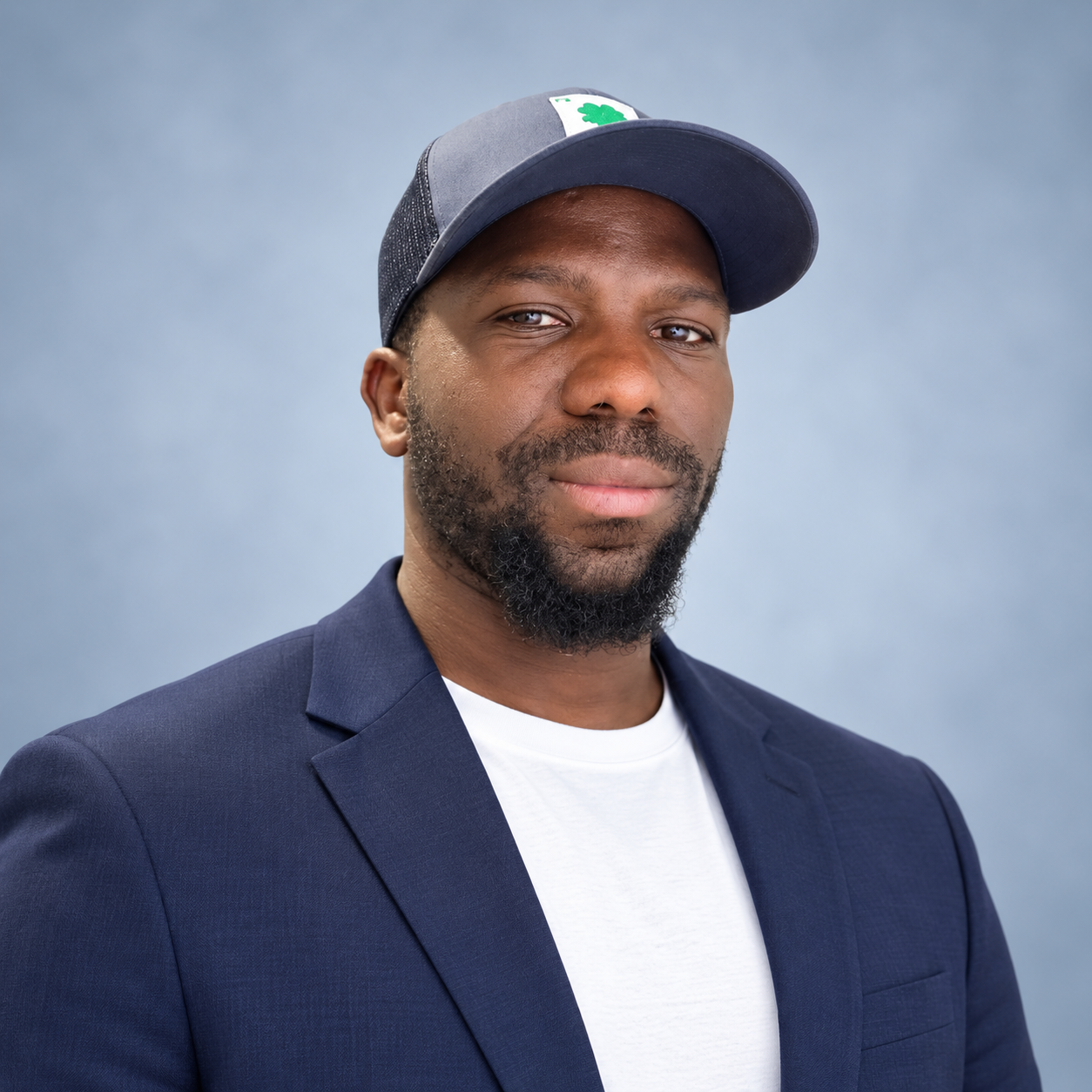 Portrait of Adama Diouf in a navy blazer